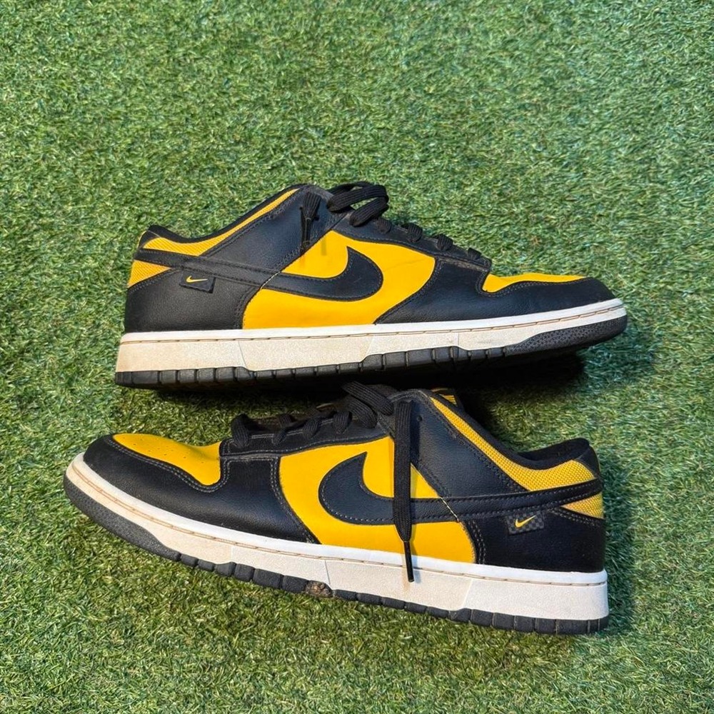 Nike Dunk Low black and yellow sneakers in men's size 12.